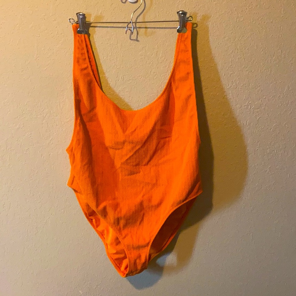 Lightly used orange one piece.